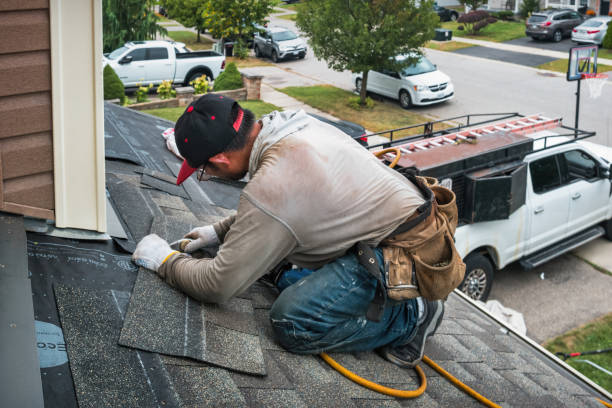 Professional Flat Roof Repair technician working in New Columbia, PA